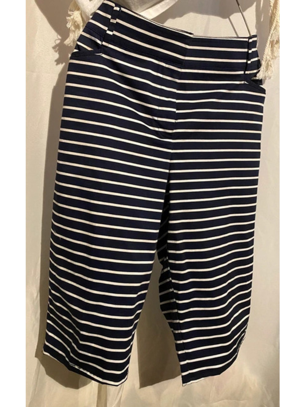Capri shorts just above the knee